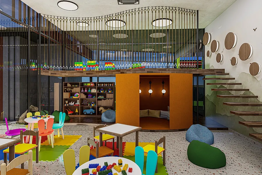 The children's day care, double height, with a play den, low tables and a soft stair.